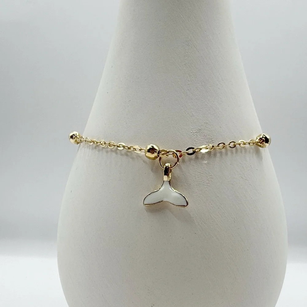 Gold Beaded Bracelet With Whale Tail Charm